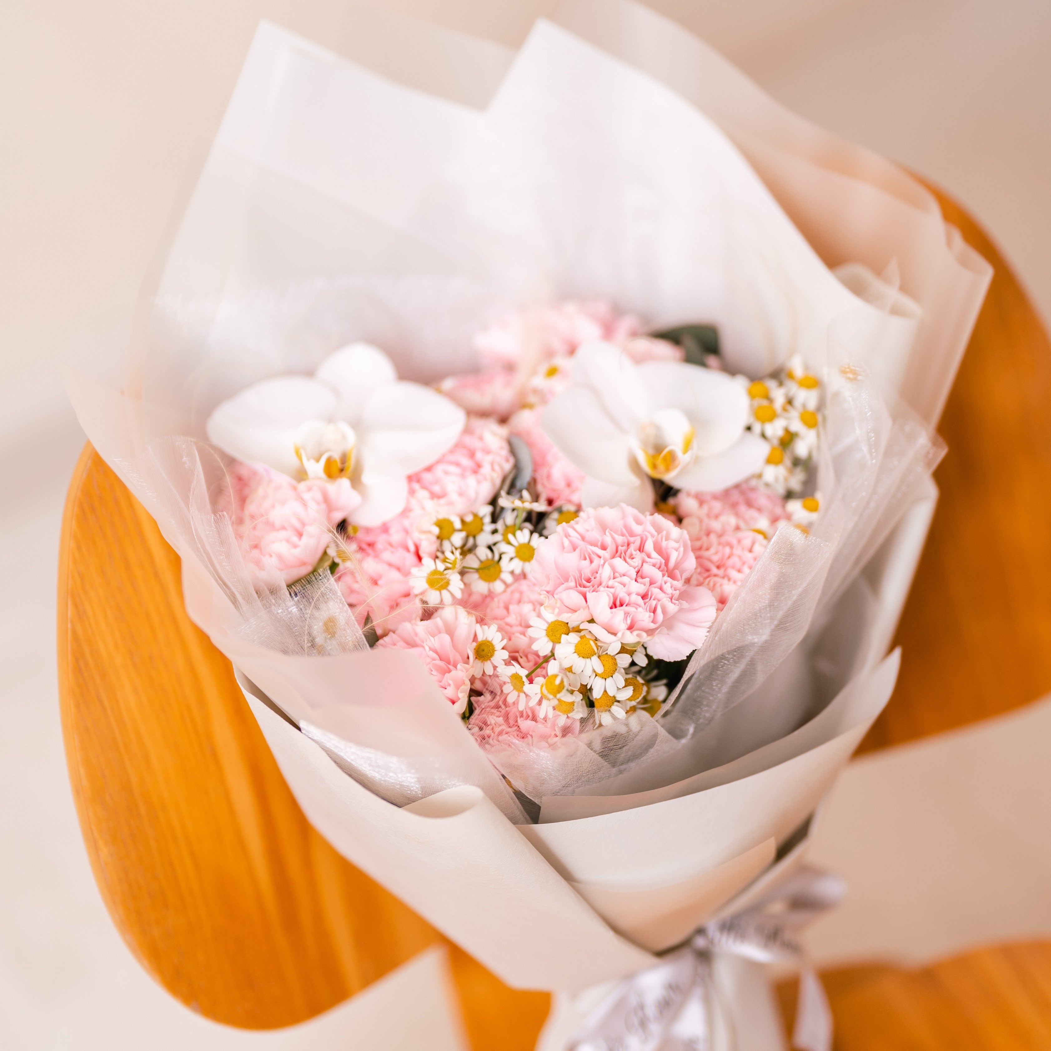 Carnation And Phalaepnosis Bouquet