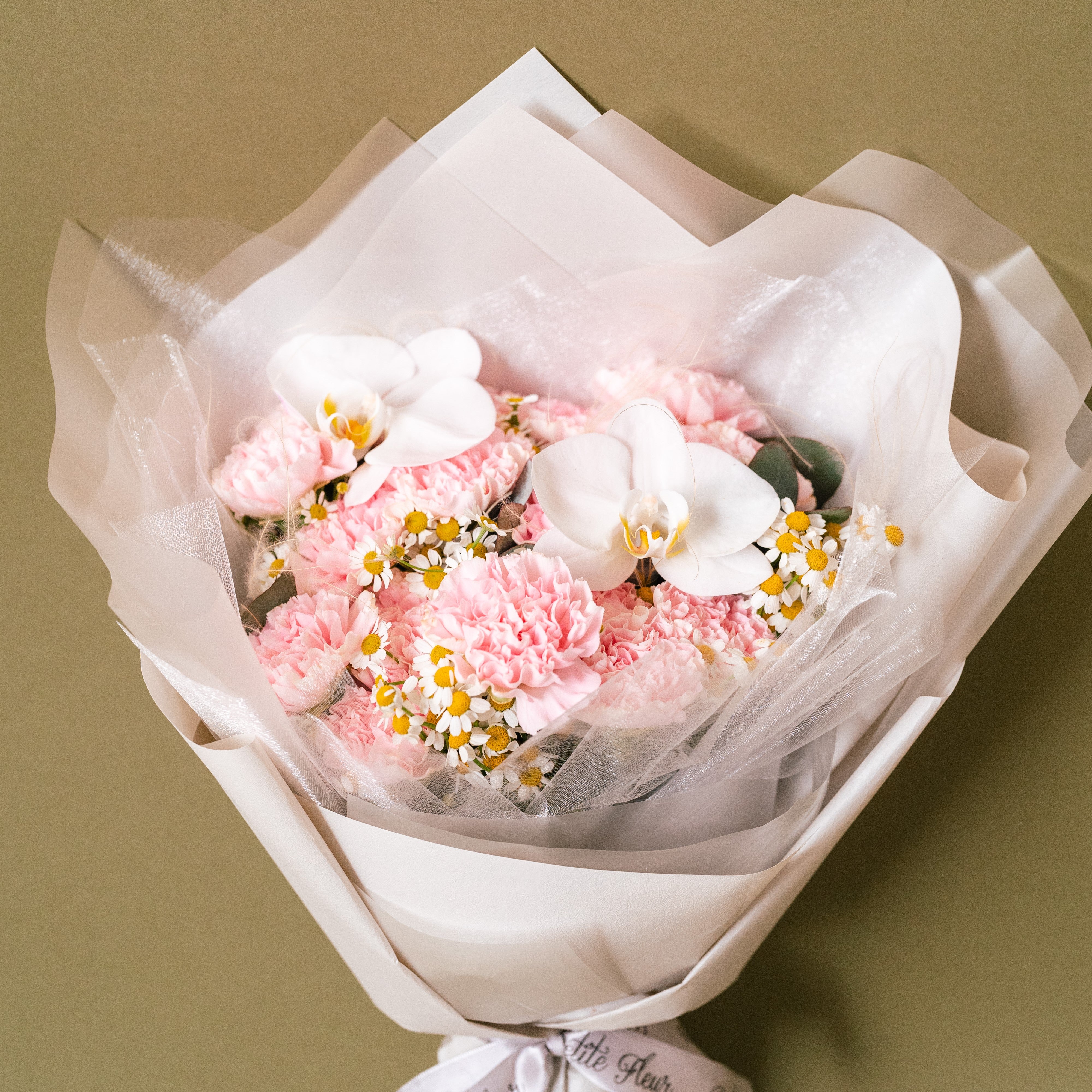 Carnation And Phalaepnosis Bouquet